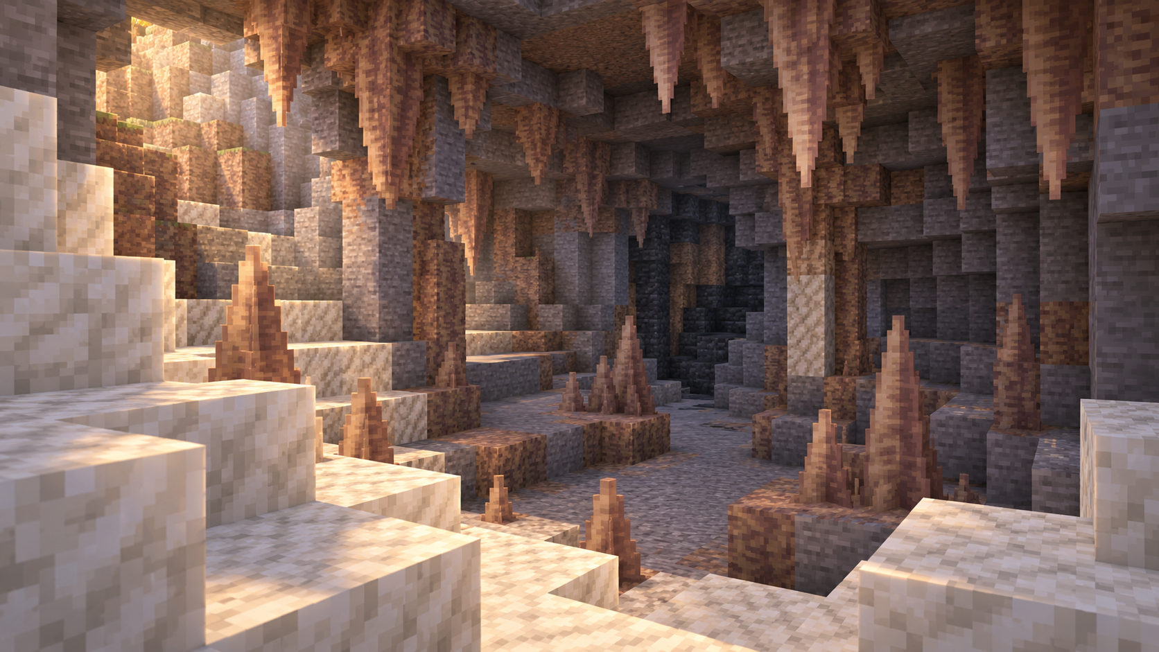 Calcite terraces and pointed dripstone mark a dry chamber with a darker route below.
